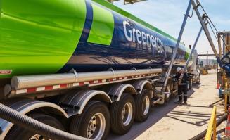 A "Greenergy" truck being filled with sustainable used cooking oil fuel.
